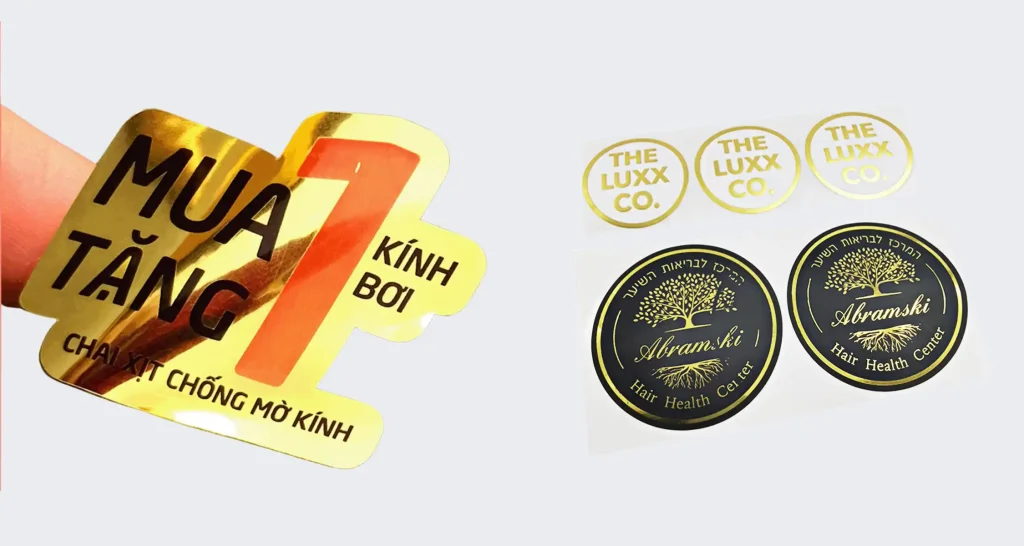 An assortment of custom die-cut metallic gold stickers, showcasing different finishes, shapes, and custom logo designs.